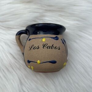 Los Cabos clay mug with blue yellow and white stripes